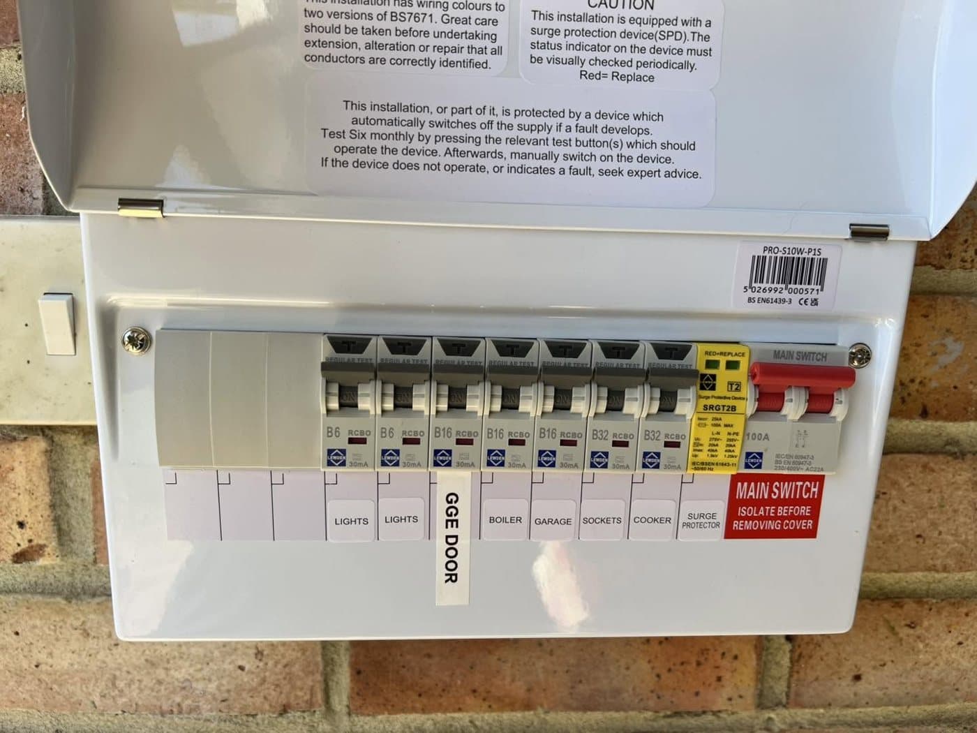 Fully wired consumer unit with labelled circuits and a clearly marked main switch