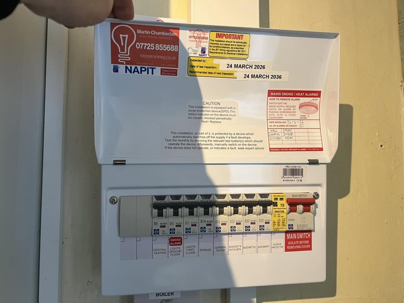 New consumer unit neatly wired with individual breakers, surge protection and a NAPIT certificate label